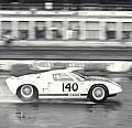 Nurburgring, Germany, 1964. Phil Hill at speed in New Ford GT40. 